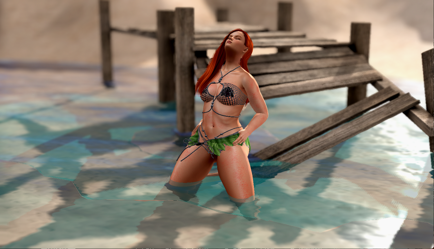 woman on knees on beach with dilapidated pier.